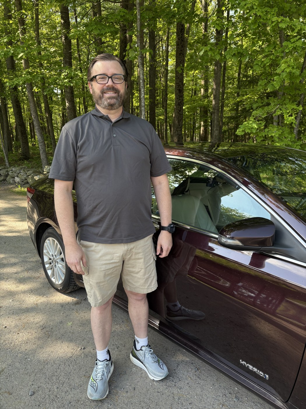 Neal standing next to the Avalon
