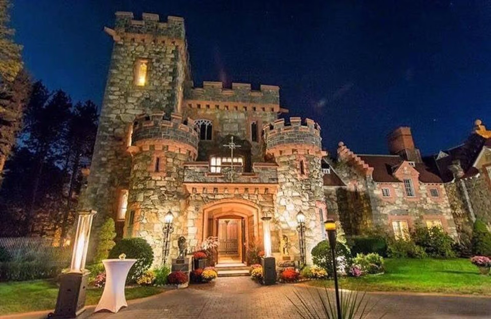 Searles Castle in Windham lit up at night
