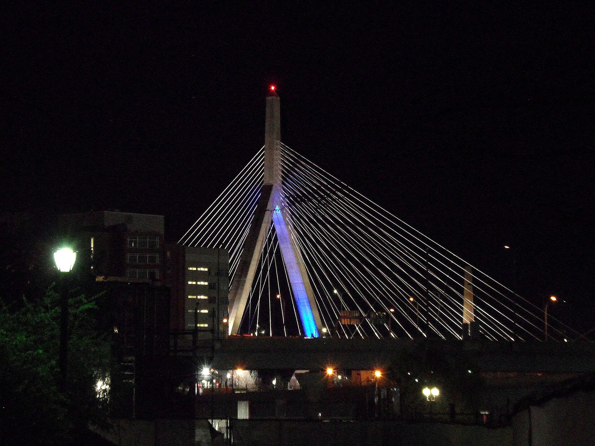 The Zakim Bridge lit up at night